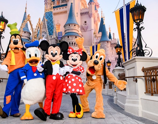 Mickey and friends in front of Cinderella Castle at Magic Kingdom, Walt Disney Resort, Orlando.