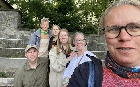 Group of tourists enjoying Mozart's Salzburg self-guided city exploration game.