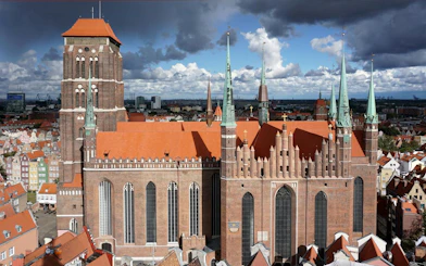 St. Mary's Church with red rooftops in Gdansk Old Town, view from above.