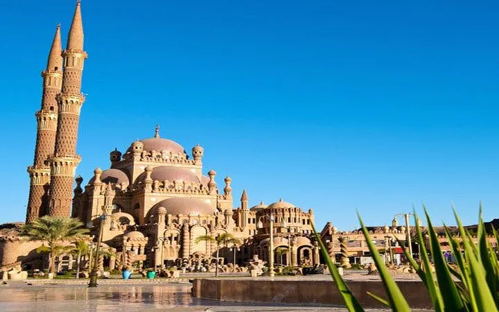 Mosque with ornate domes and minarets in Sharm El Sheikh during private city tour.
