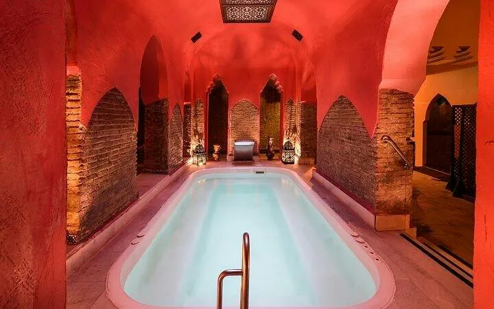 Traditional Moroccan hammam interior with pool, Marrakesh.