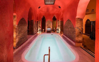 Traditional Moroccan hammam interior with pool, Marrakesh.