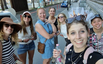 Group of tourists enjoying the Ghosts of Budapest self-guided city exploration game.
