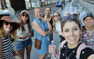 Group of tourists enjoying the Ghosts of Budapest self-guided city exploration game.