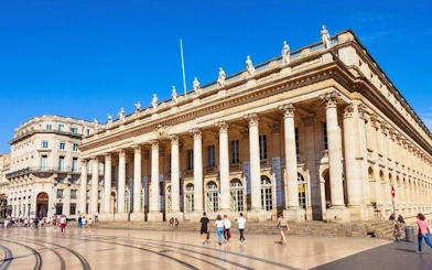 Bordeaux Grand Théâtre with visitors, featured in self-guided walking tour app.