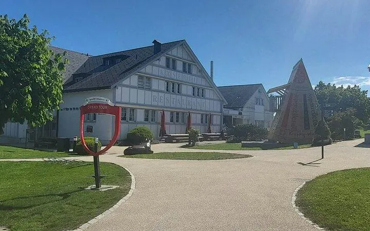 Traditional Swiss building in Appenzell with a sculpture, part of Zurich's Appenzell, Liechtenstein & Heidiland tour.