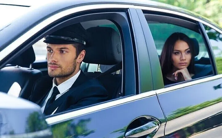 Private driver and passenger in car for Agadir to Marrakesh transfer.