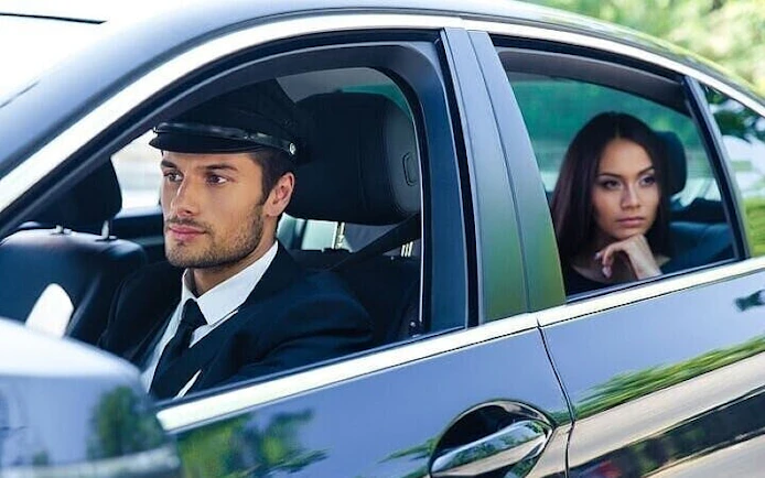 Private driver and passenger in car for Agadir to Marrakesh transfer.