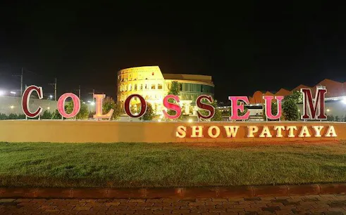 Colosseum Show Pattaya entrance sign illuminated at night, Pattaya.