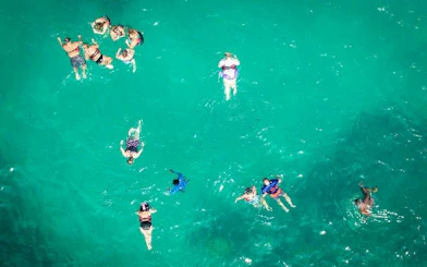 Snorkelers enjoying clear waters at Miches Natural Reserve, Punta Cana.