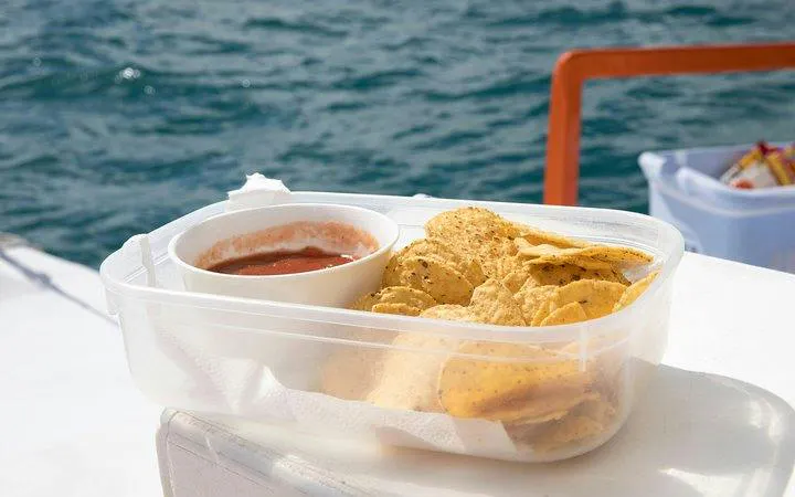 Chips and salsa on a catamaran during a Punta Cana snorkeling tour.