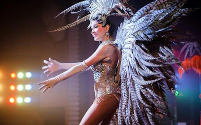 Performer in elaborate costume at Alcazar Cabaret Show, Pattaya.