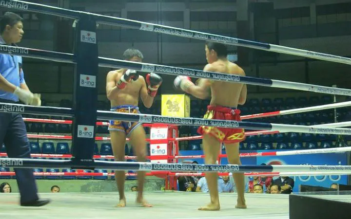 Muay Thai fighters in action at Rajadamnern Stadium, Bangkok.