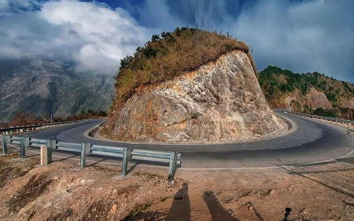 Sa Pa motorbike tour winding road at O Quy Ho Pass, Vietnam.