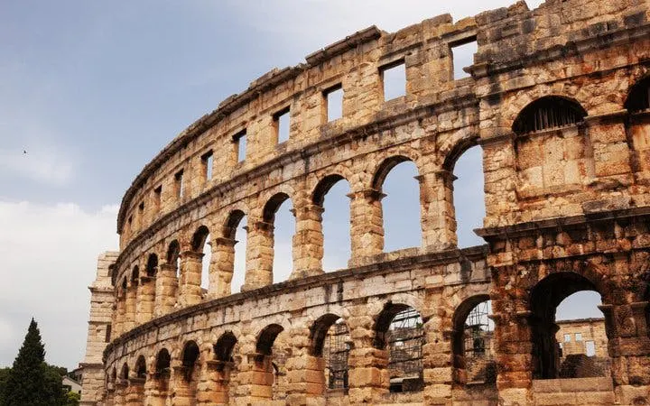 Pula Arena exterior view on self-guided walking tour.