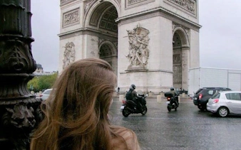 Arc de Triomphe with nearby traffic, Paris.
