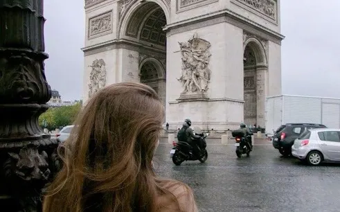 Arc de Triomphe with nearby traffic, Paris.