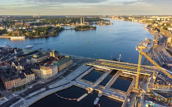 Aerial view of Stockholm waterfront with historic buildings and boats, Sweden.