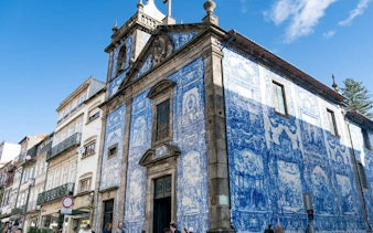Azulejo-tiled church facade in Porto's historic center.