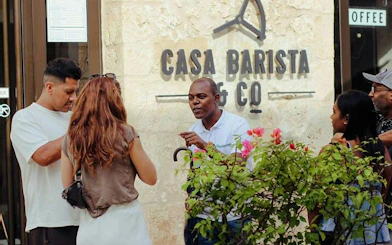 Group of tourists at Casa Barista & Co during Santo Domingo Colonial Zone walking tour.