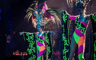 Performers in vibrant costumes at Tiffany's Cabaret Show, Pattaya.