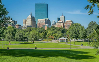 Boston Common with city skyline, part of the Freedom Trail self-guided audio walking tour.