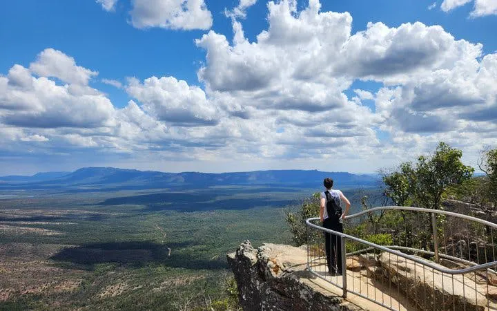 Hiker overlooking vast landscape at Grampians National Park during small-group tour.