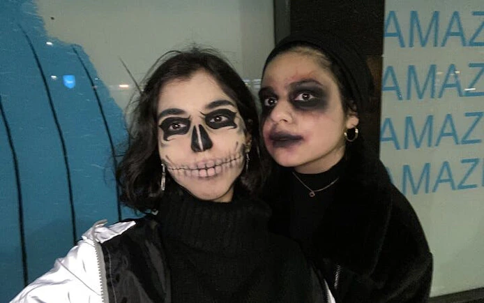 People with Halloween makeup during Haunted Manchester city exploration game.