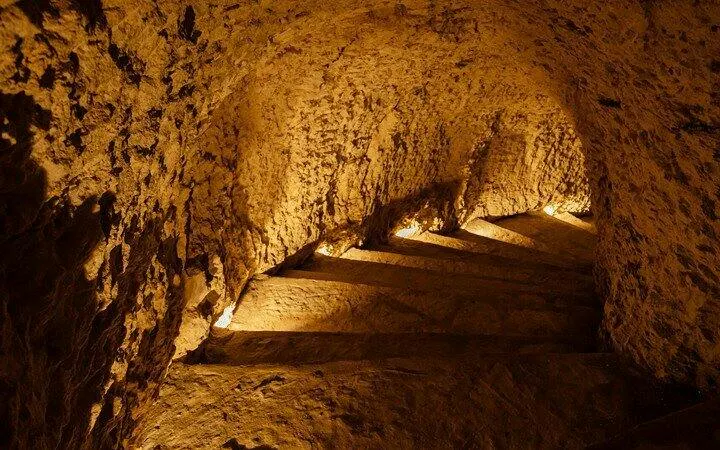 Subterranean stone steps leading to hidden cenotes in Punta Cana, Dominican Republic.