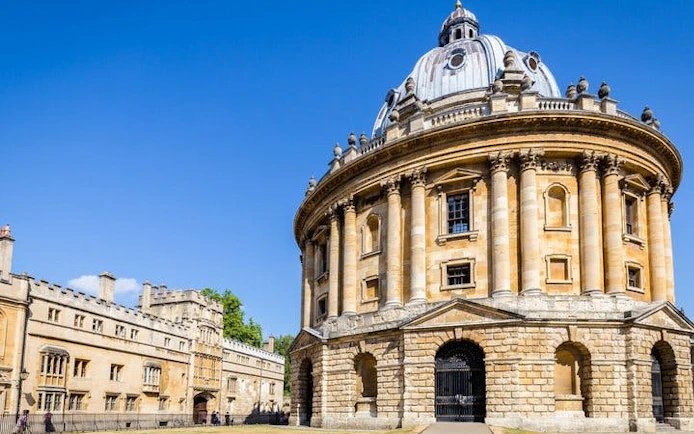 Radcliffe Camera in Oxford on a sunny day, part of a self-guided walking tour.