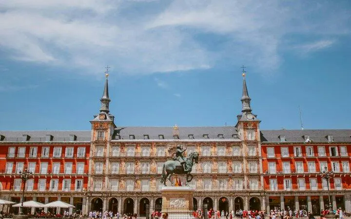 Plaza Mayor with equestrian statue, Madrid Old Town walking tour.