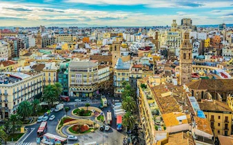 Valencia cityscape with historic buildings and central plaza, view from above.