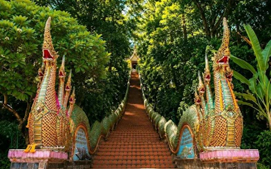 Staircase with ornate dragon sculptures leading to Wat Doi Suthep in Chiang Mai.
