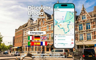 Breda city guide app displayed on smartphone with historic buildings in background.