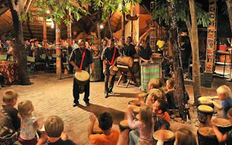 Drummers performing at a Boma dinner on the Zambezi River Sunset Cruise, Victoria Falls.