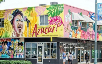 Murals on a building in Little Havana, Miami, featuring Celia Cruz and vibrant Cuban art.