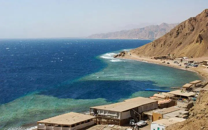 Blue Hole coastline with mountains and buildings, Sharm El Sheikh, Egypt.