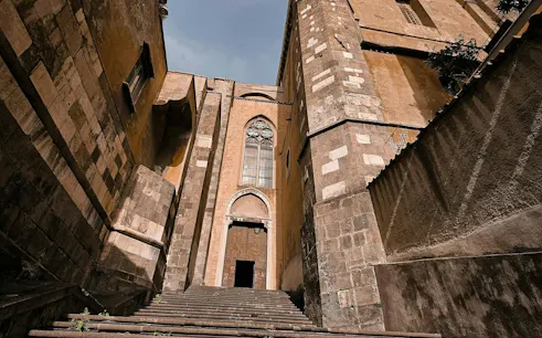 Steps leading to a historic building facade in Naples Historic Center.