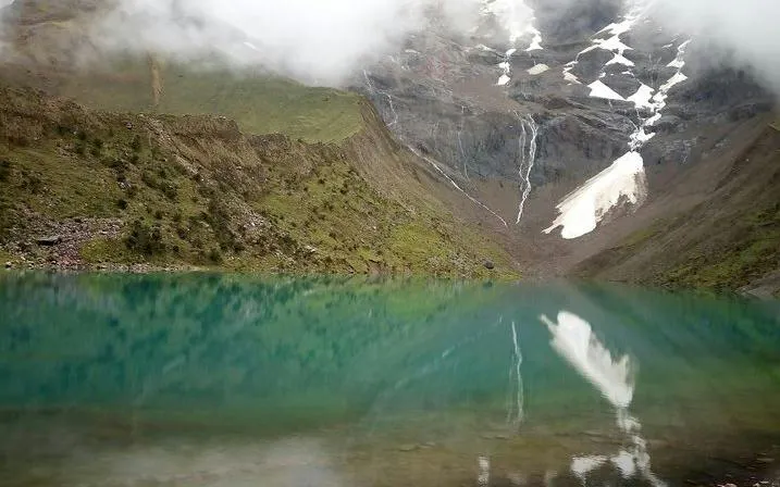 Humantay Lagoon with mountain reflection, part of the trek from Cusco.