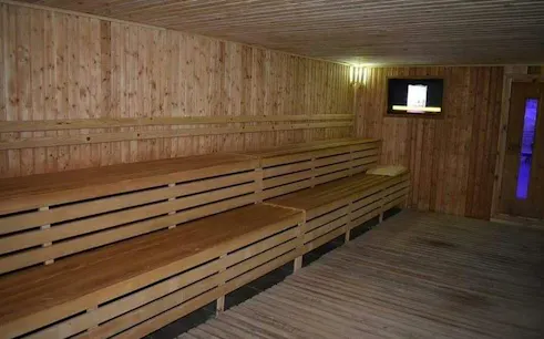 Wooden steam bath interior with benches, part of Moroccan bath experience in Hurghada.