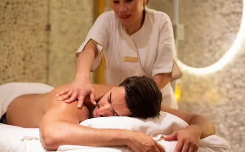 Moroccan hammam massage in Marrakech spa setting.