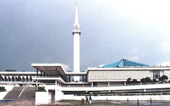 National Mosque of Malaysia with its minaret and blue roof in Kuala Lumpur.