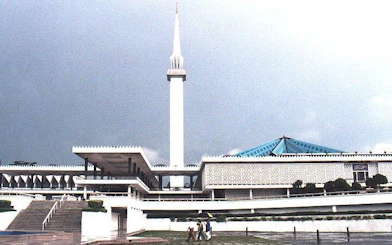 National Mosque of Malaysia with its minaret and blue roof in Kuala Lumpur.