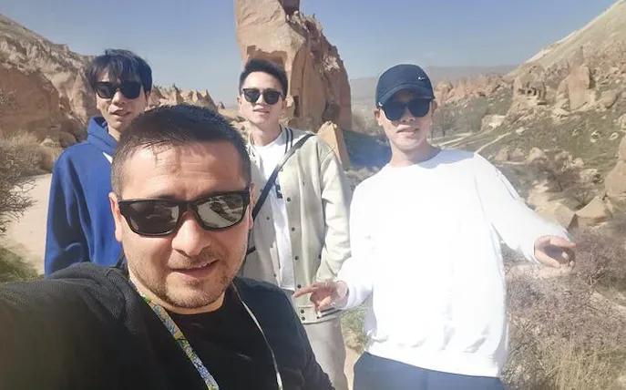 Group exploring Cappadocia rock formations on a private 2-day tour from Istanbul.