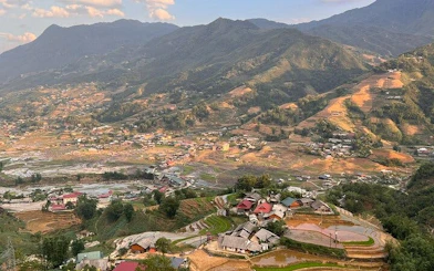 Sapa rice terraces and village view from motorbike tour in Vietnam.