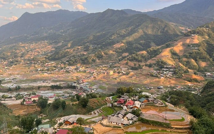 Sapa rice terraces and village view from motorbike tour in Vietnam.