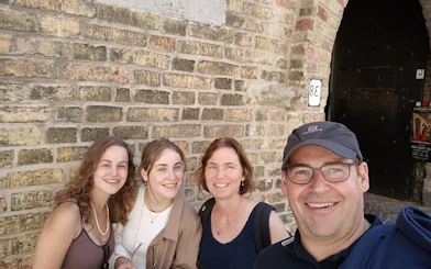 Group enjoying a self-guided city exploration game in Bruges.