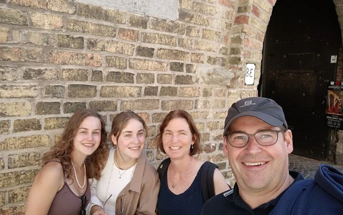 Group enjoying a self-guided city exploration game in Bruges.