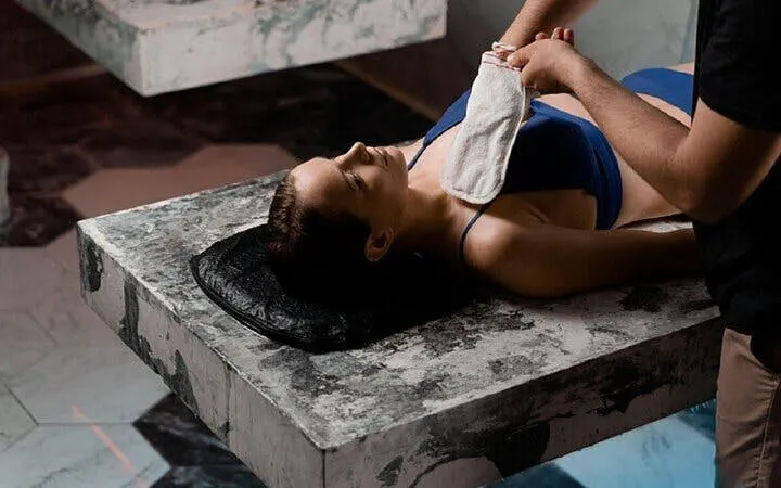 VIP Moroccan hammam massage experience in Marrakesh spa setting.