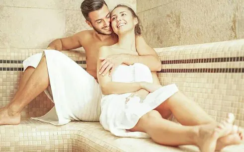 Couple relaxing in a sauna, part of a 45-minute massage package in Hurghada.